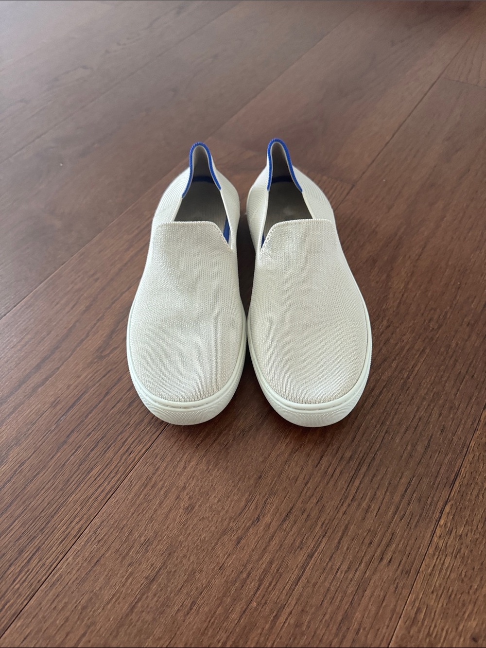 Women’s Rothy’s  Slip-On shoe in Off-White with Blue Trim Size 8